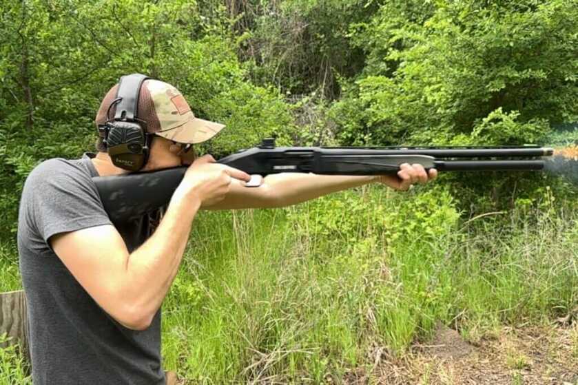 Shotgun firing outside with Holosun SCS Carry on top