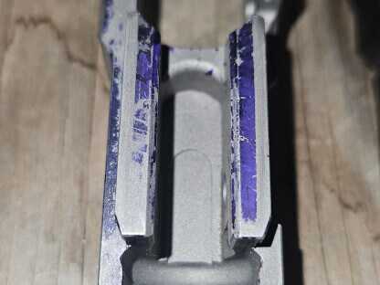 Different brand frame with radiused edge on vertical impact surface.