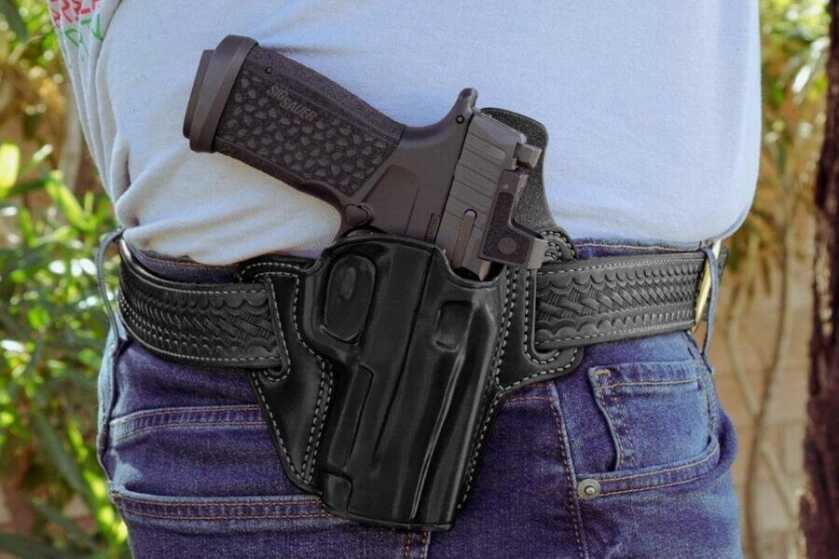 A holstered P365 Fuse on a man's waist. 