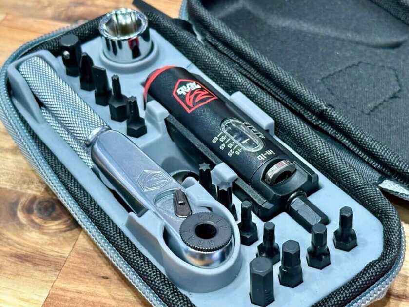 Real Avid X3 Driver Kit closeup shows bits, a socket, an adjustable torque adapter, and the X3 Driver.