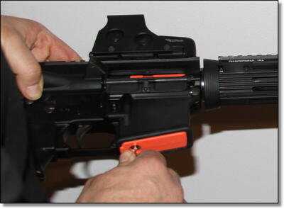 It locks flush into your magazine well, nothing to grab onto or clip It locks flush into your magazine well, nothing to grab onto or clip