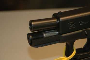photo 6 The recoil assembly (shown here) helps tame the recoil of the .357 Sig round.