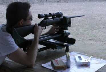 If you look closely at this picture you will notice that the scope is mounted sideways, but Ben shot it into about an inch at 100 yards on a hurried day before SHOT Show, and it did that even with a hot barrel.