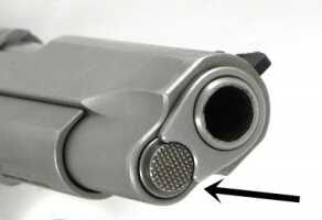 This is an example of a 1911 with a short guide rod. Because the guide rod does not protrude from the slide when operated, the recoil plug is topped with a cap.