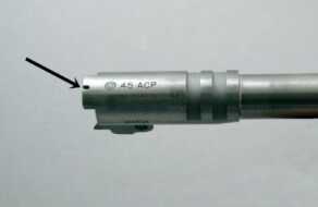 A slot in the top of the barrel facilitates checking for the presence of a chambered round.