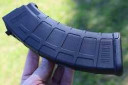 AK-47 Hog Blaster - The Ultimate Counter Insurgency Weapon The dull sheen of the PMAG's polymer coat won't reflect too much light.