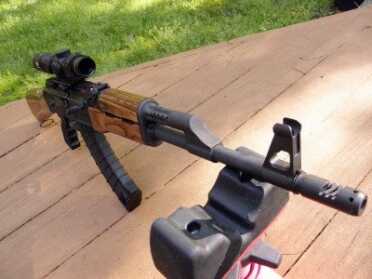 You can see the gas tube, which actuates the bolt carrier group, on top of the C39 just forward of the hand guard.