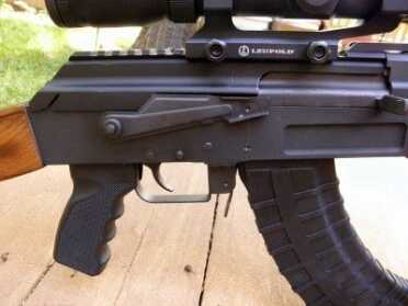 The big lever above the trigger is the clunky AK-47 safety. It was very tight at first, but the more it’s used, the easier it gets to manipulate. The lever sticking down between the trigger guard and the magazine is the clunky AK-47 mag release.