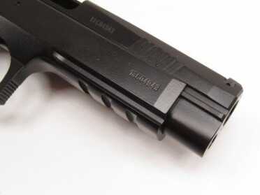 On pistols of this type, the slide runs on rails inside the frame. Some shooters feel this enhances accuracy by reducing slide to frame play. The trade-off is a reduced gripping surface available on the slide.