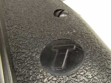 The hard polymer grips have a low profile flattened nugget texture that felt slippery in my hands.