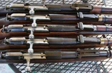 The Mosin-Nagant is the cheapest option you can buy for real, shoot through just about anything firepower. At $75-$250, they are simple and reliable, and the ammo is really cheap right now. 