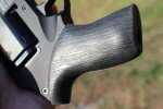 The rubberized grip has a faux wood grain that makes it even more grippy. 