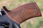 The grip on the 60DS is wood, but it is still highly textured. It is a solid grip with excellent texture. 
