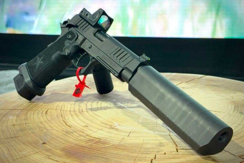 SilencerCo S98 is attached using a 3-lug mounting system and sits lower than cylindrical suppressors