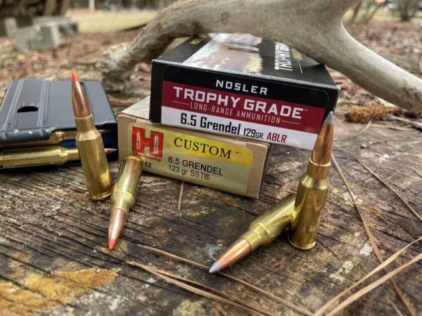 6.5 Grendel hunting ammo from Hornady and Nosler staged for deer and hog hunting