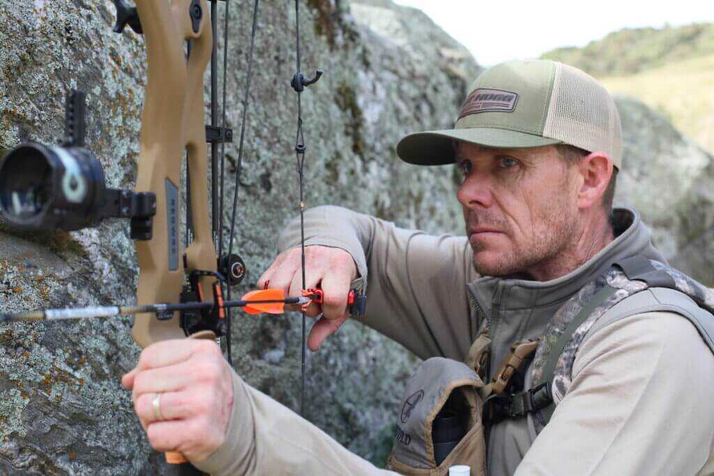 Man Bowhunting Tahr