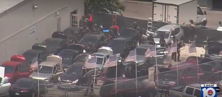warehouse gunman shoots owner of used car dealership