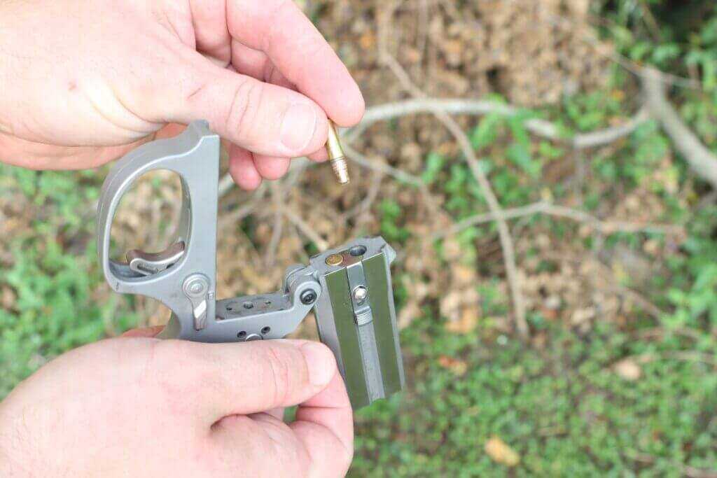 Bond Arms Stinger RS .22 LR derringer showing compact two-shot rimfire woods gun design