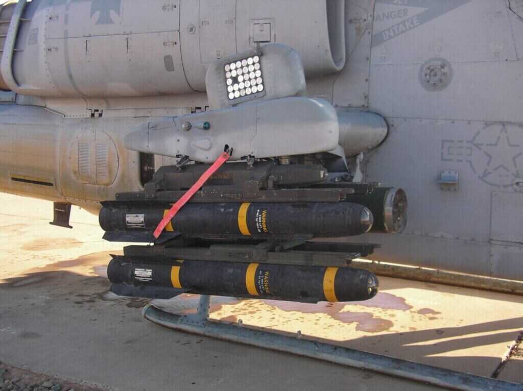 AH-1 Cobra helicopter associated with the AGM-114 Hellfire missile weapon system