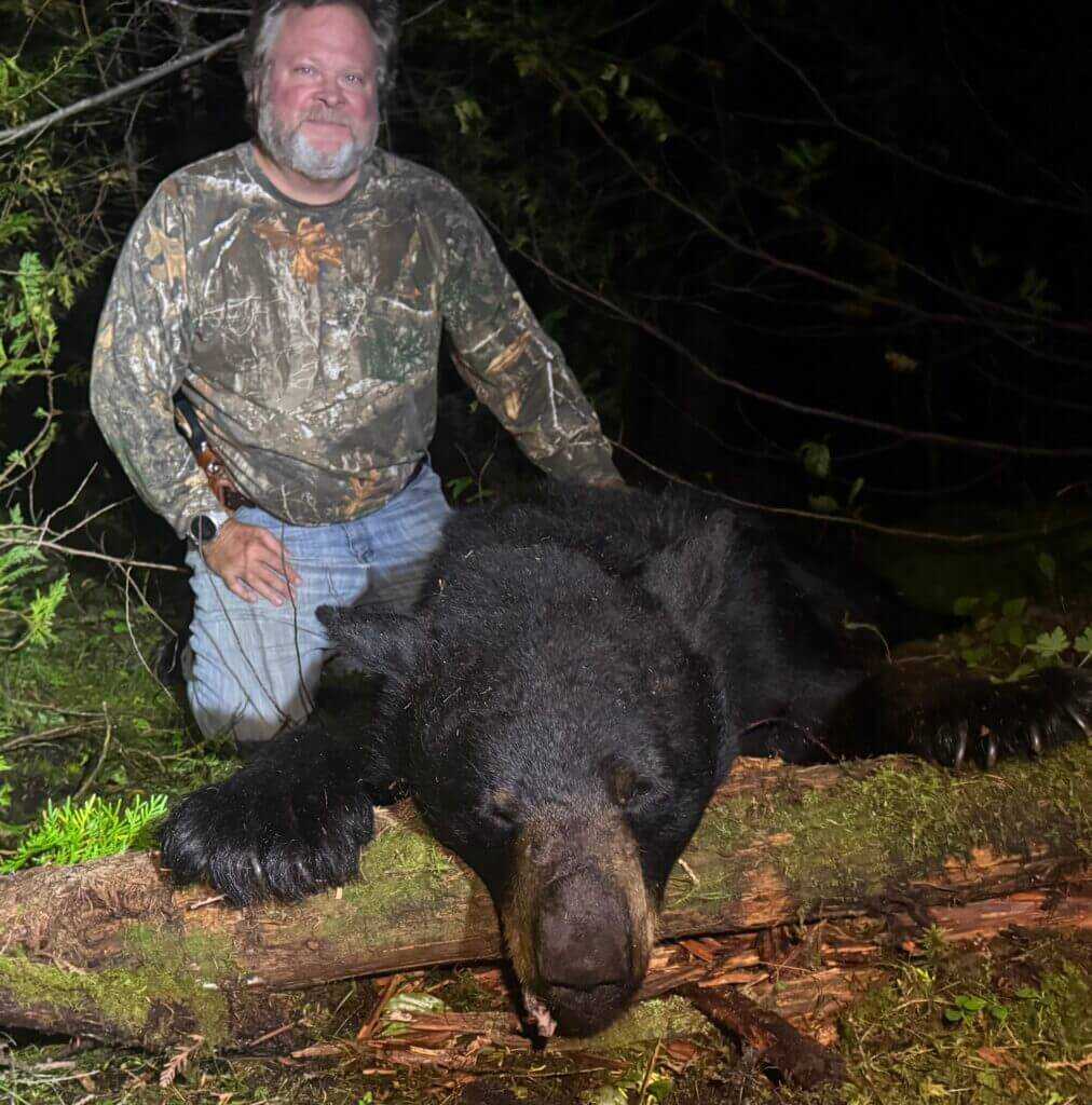 Chris with his 340 pound Maine black bear taken early in the handgun hunt