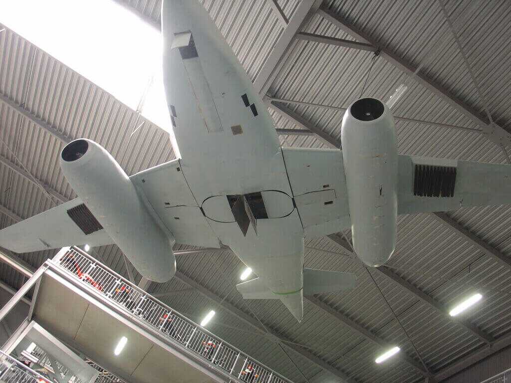 plane hanging from the roof. bomber