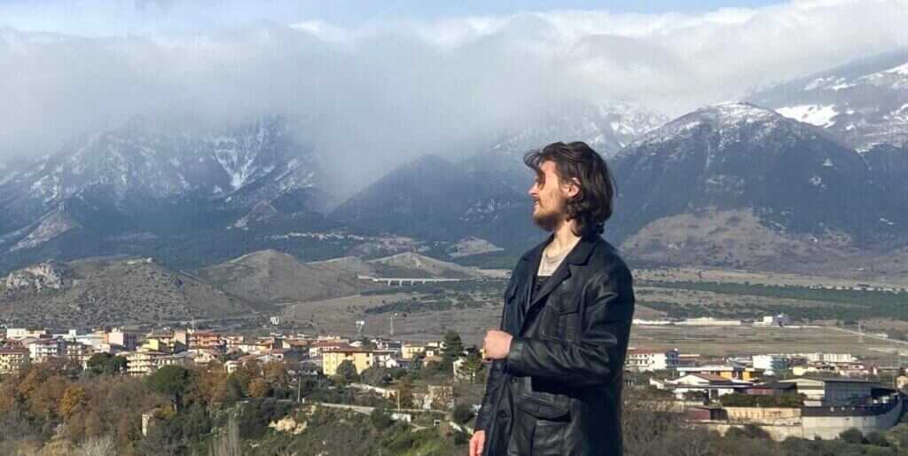 Michael Gloss traveling and engaging with causes before leaving the United States for Russia