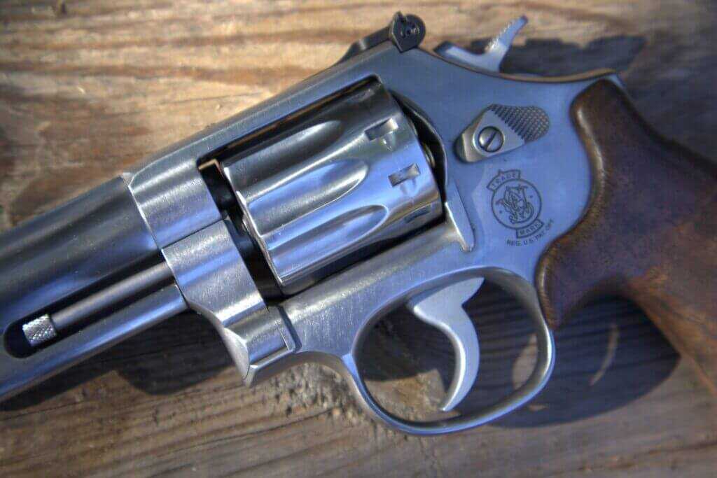 S&W 617 Mountain Gun cylinder, ejector rod, K-frame crane lockup, and no-lock sideplate detail