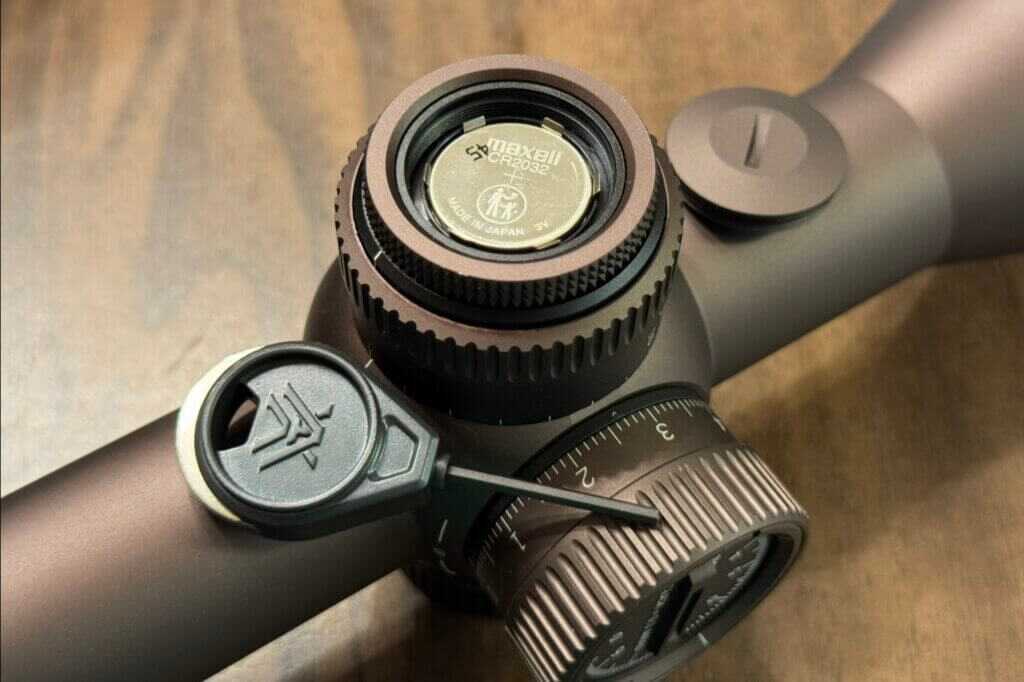 CR2032 battery powering the illuminated reticle on the Vortex Razor 4-24x44