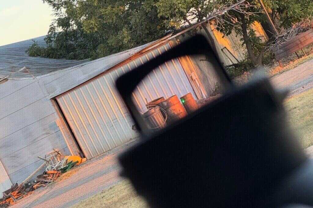 Lower profile elevation turret on the Razor 4-24x44 with Defender-XL red dot mounted at 12 o'clock