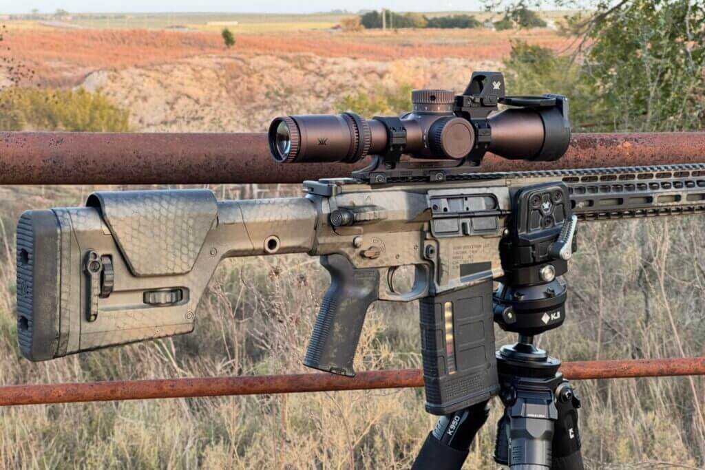 Vortex Razor 4-24x44 mounted on an Aero AR10 in a Vortex Rifle Clamp on a Kopfjager K950 tripod