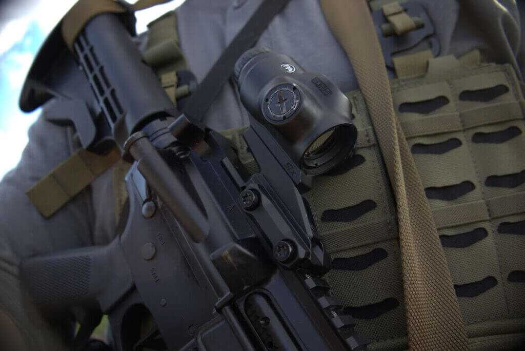 primary arms slx optic mounted on an ar-15 rifle