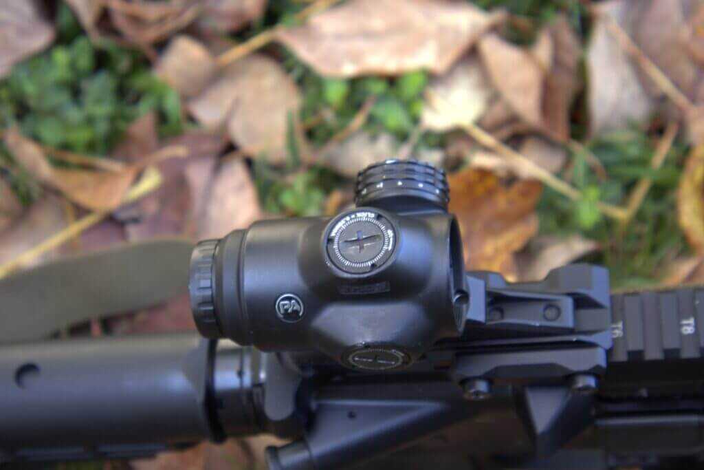 Primary Arms SLx 3x prism sight top view showing windage and elevation turrets
