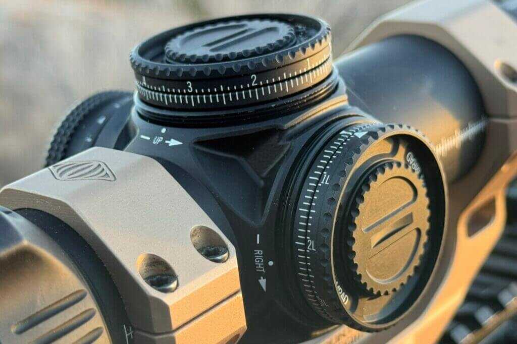 Close-up of Vortex AMG 1-10x24 split turret rings for dual-zero system