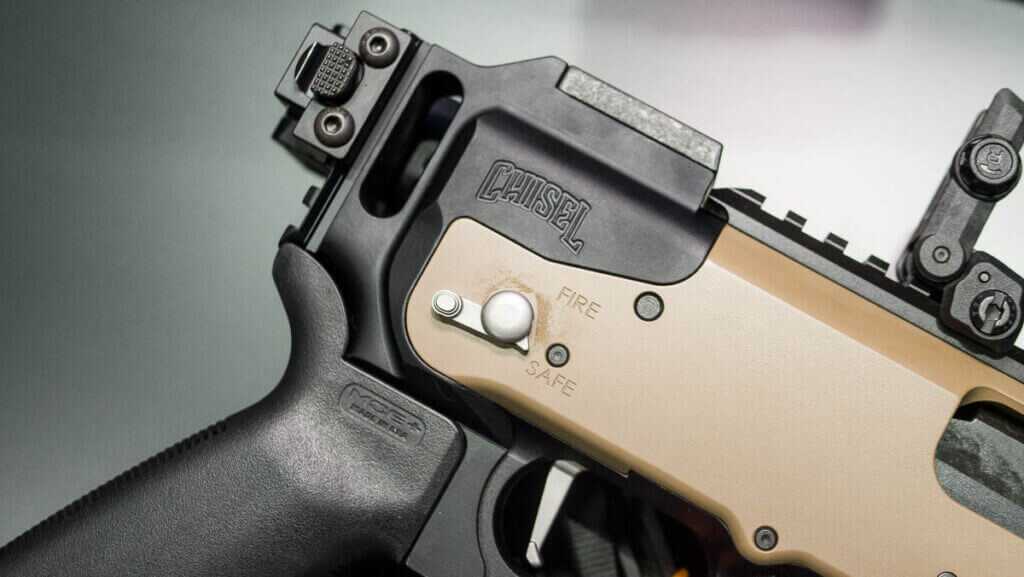 Close up view of the right side of the receiver with the stock folded.