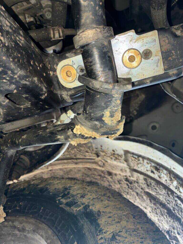 Broken Lexus GX470 front sway bar bracket after aggressive off-road driving with Bilstein 8112 shocks
