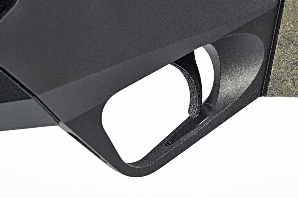 Externally adjustable trigger on Benelli Lupo Alpha rifle inside magazine well