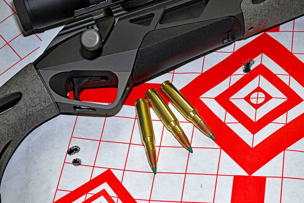Benelli Lupo Alpha rifle target showing tight test groups and sub-MOA accuracy