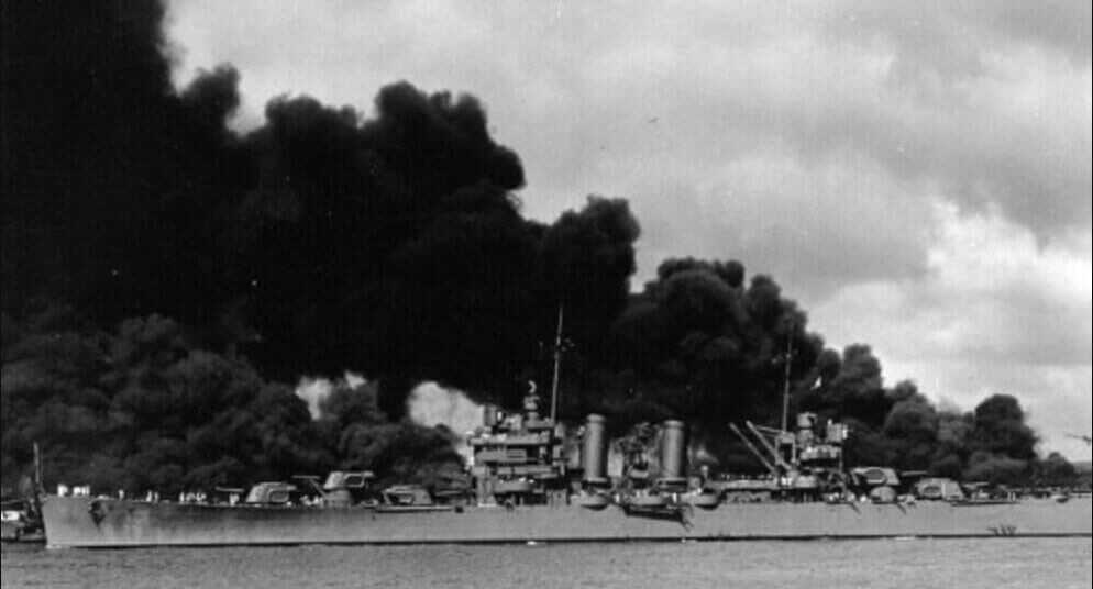 USS Aylwin navigating past burning ships in Pearl Harbor under Ensign Stanley Caplan to reach open ocean