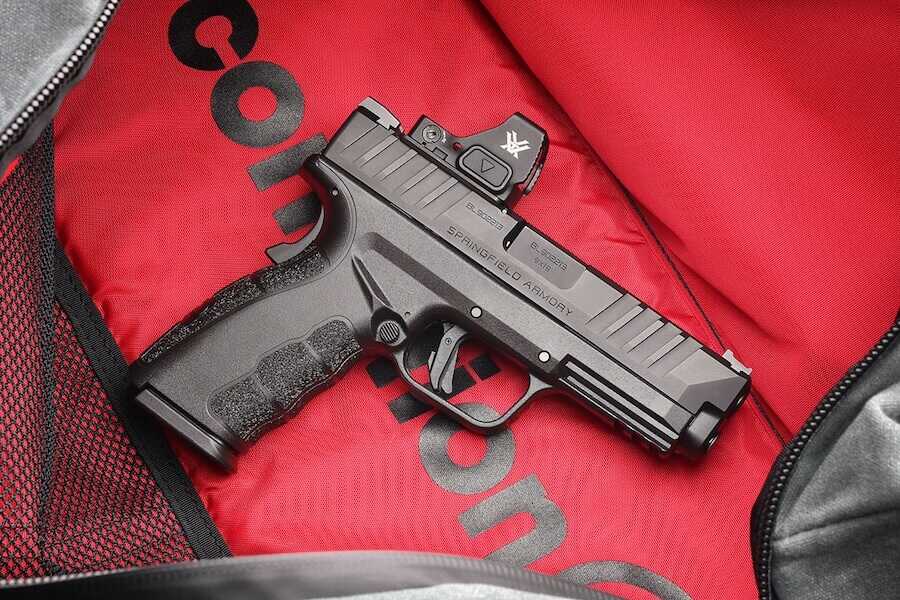 The XD Mod 4 OSP over a red background.