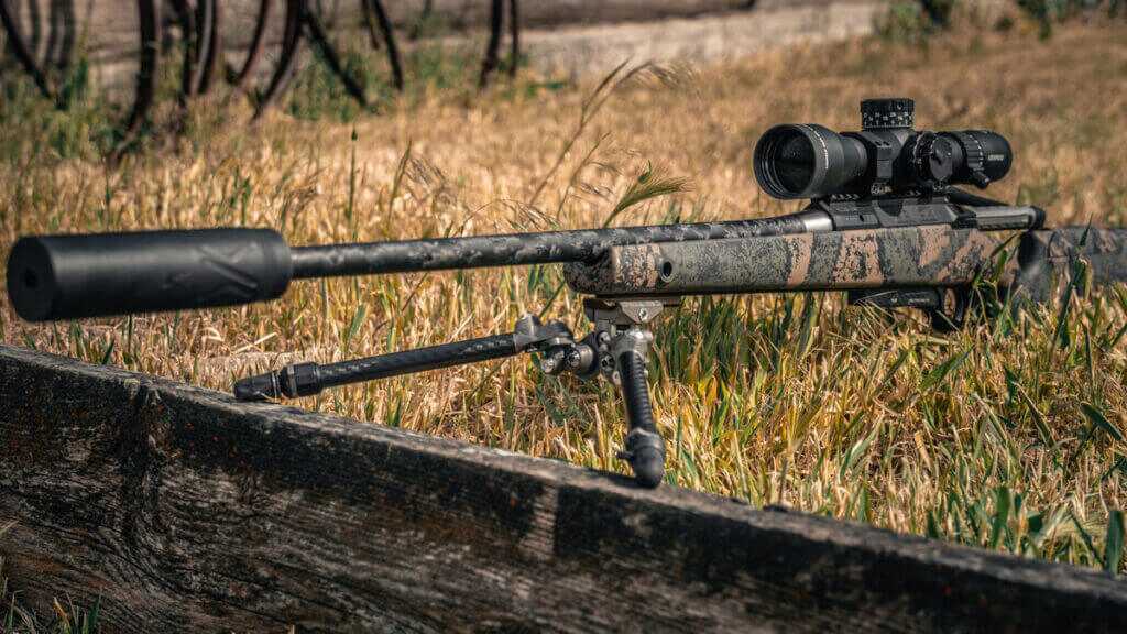 Backlanz lightweight hunting bipod leg adjustment system showing close-to-ground prone setup