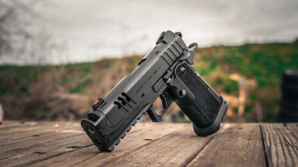 EAA Witness2311 CMXX review pistol on the range showing compact slide and full-size grip