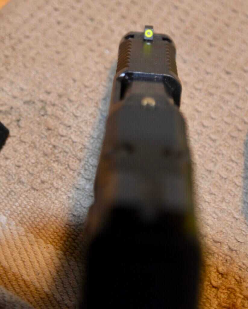 Top view of the Smith & Wesson M&P Shield X slide showing front serrations and front night sight