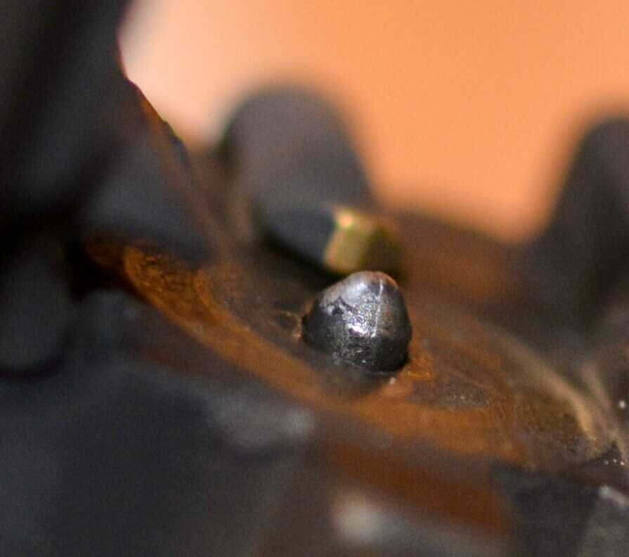 Smith and Wesson M&P 2.0 striker showing where firearm microstamping characters would be engraved