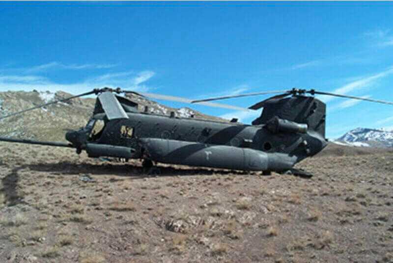 Battle-damaged MH-47E tail number 476 after emergency landing below Takur Gar