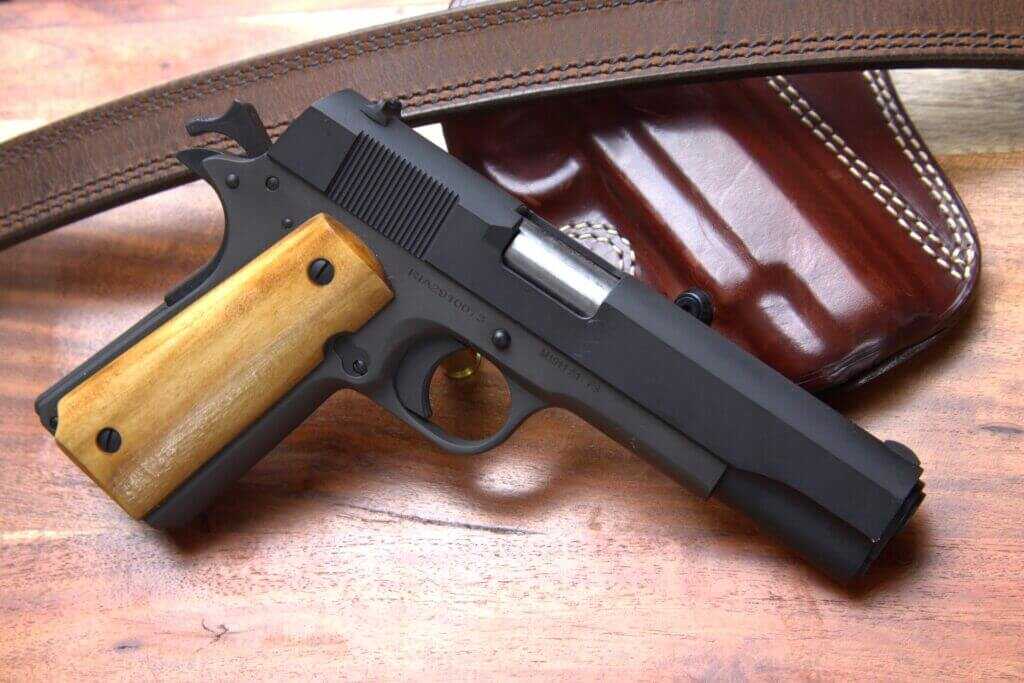 Rock Island Armory GI Standard 1911 pistol with holster and gun belt in .45 ACP