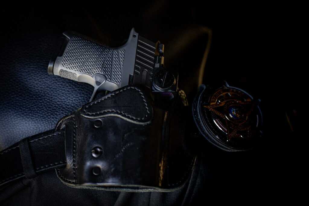 SIG P365 daily carry setup with holster and everyday concealed carry gear