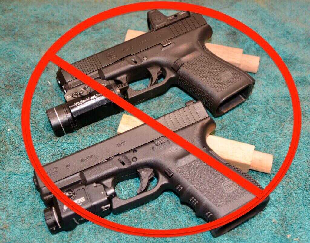 No Glocks Allowed sign for Glock alternatives and striker fired pistol review