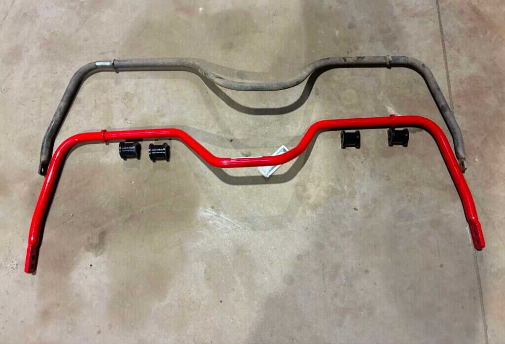 Nolathane 24mm rear sway bar beside stock Lexus GX470 rear sway bar