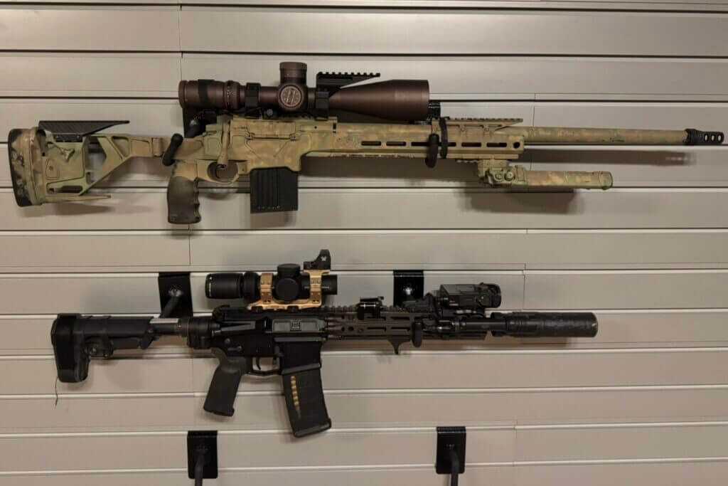 Adjustable Hold Up Displays rifle hooks angled to keep two rifles perfectly level