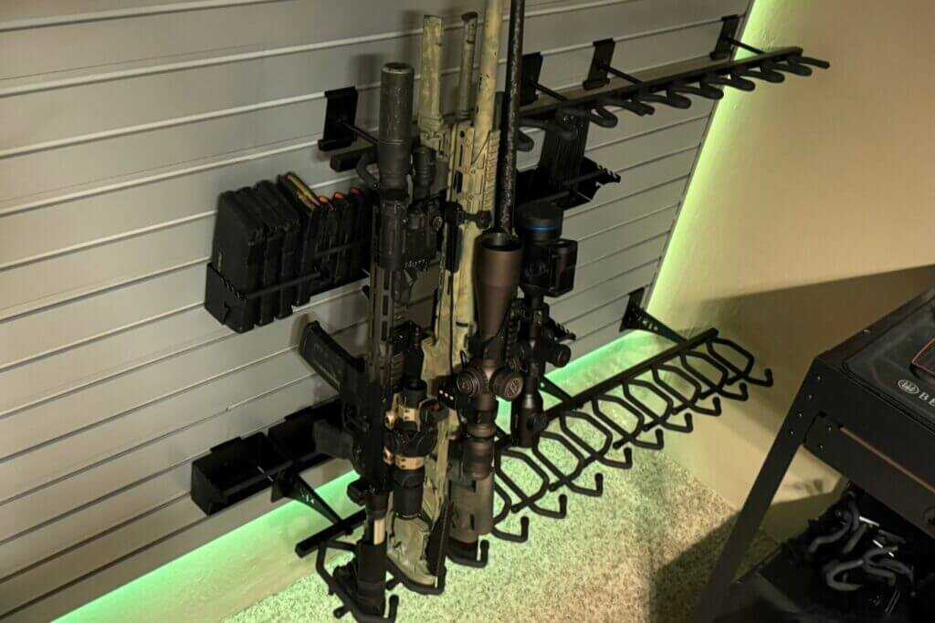Two vertical Hold Up Displays 6 Gun Racks storing long guns side by side